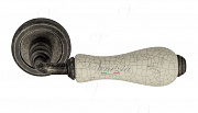 Дверная ручка Venezia "COLOSSEO" белая керамика паутинка D1 античное серебро
